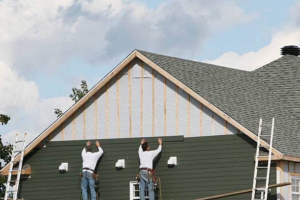 Professional Siding technician working in Ada, OH